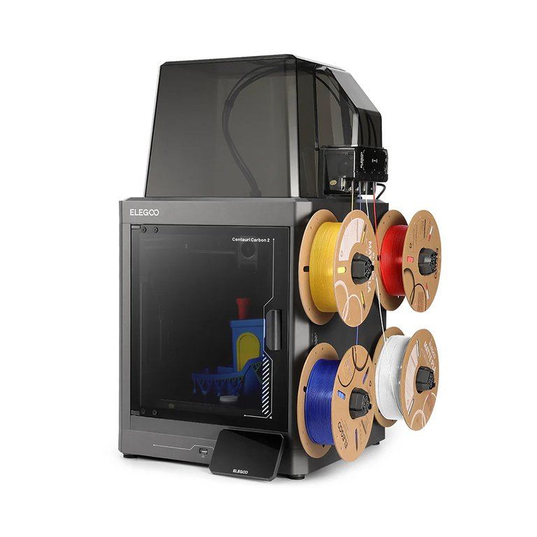 Impresora cerrada con varios rollos tipo Centauri Carbon 2 Combo